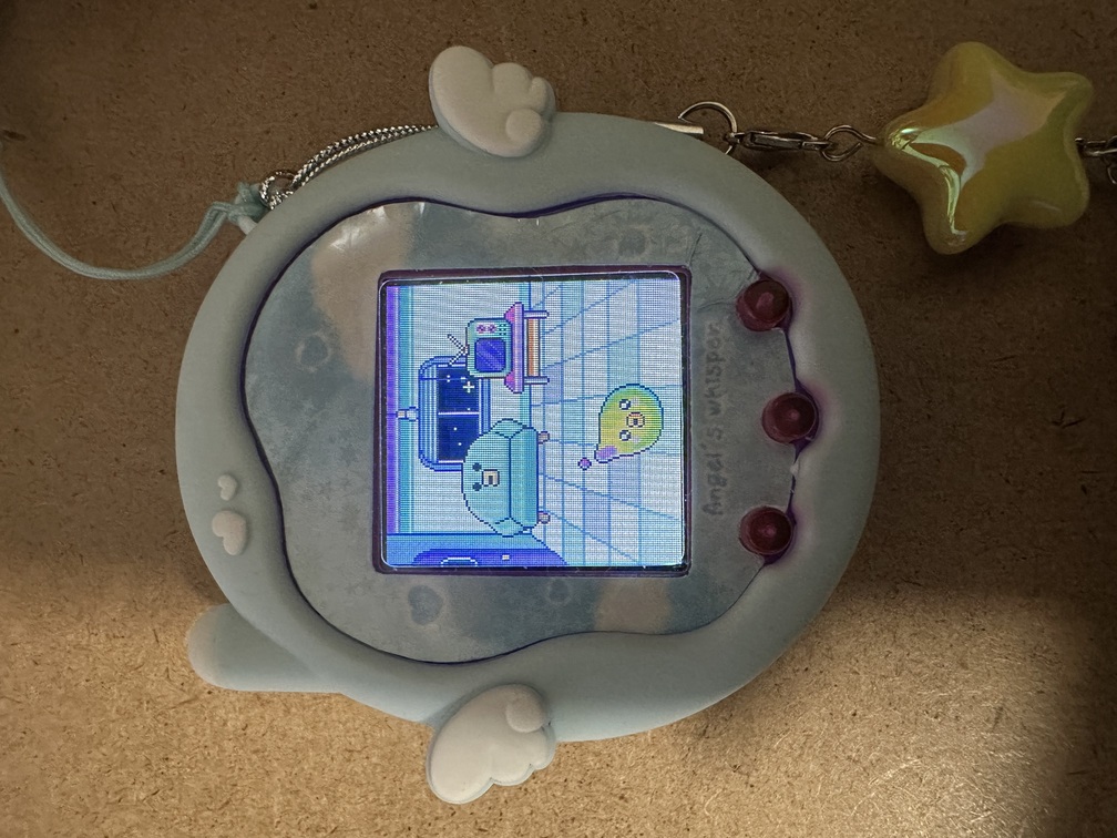 image of green magic tamagotchi on